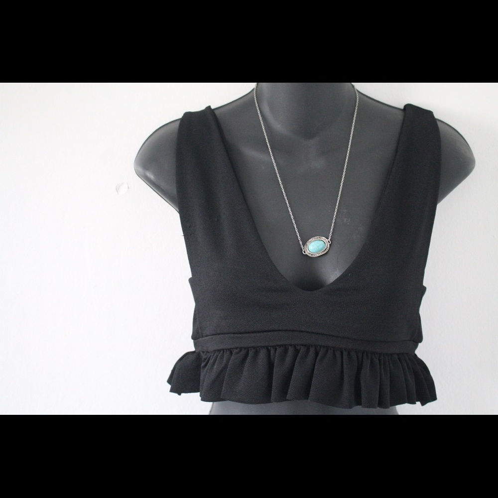PrettyLittleThing Black Frill Hem Plunged Cropped Top